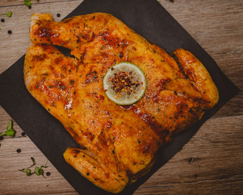 Marsh Butcheries Free-range chicken butterflied marinated in tamarind, lime and chilli sauce.