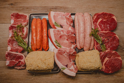 Marsh Butcheries Butcher's Box containing BBQ Cut Rib Fillet x 1kg Lamb Loin Chops x 1kg Chicken Kentucky Schnitzel x 1kg Pork Loin Chops x 1kg Thick Beef Sausages x 2kg Thick Pork Sausages x 2kg