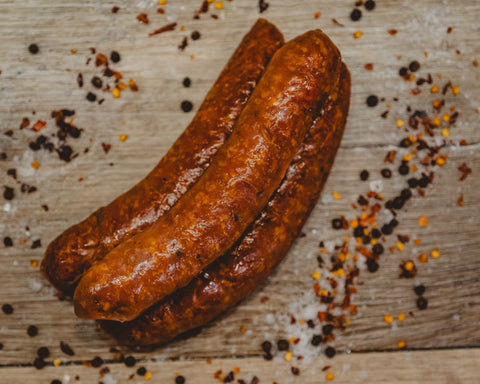 Marsh Butcheries Paprika, garlic, and pepper mixed with ground pork smoked in a natural casing.