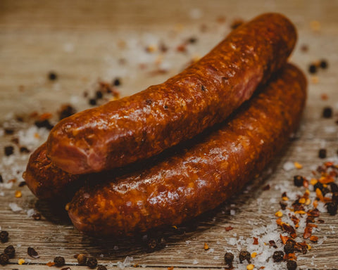 Marsh Butcheries Paprika, garlic, and pepper mixed with ground pork smoked in a natural casing.