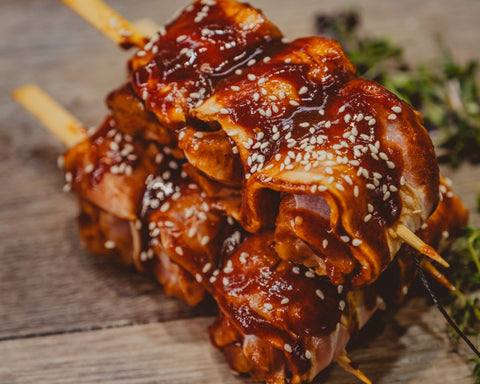 Marsh Butcheries Chicken thigh fillets wrapped in smokey bacon with hickory and honey sauce.